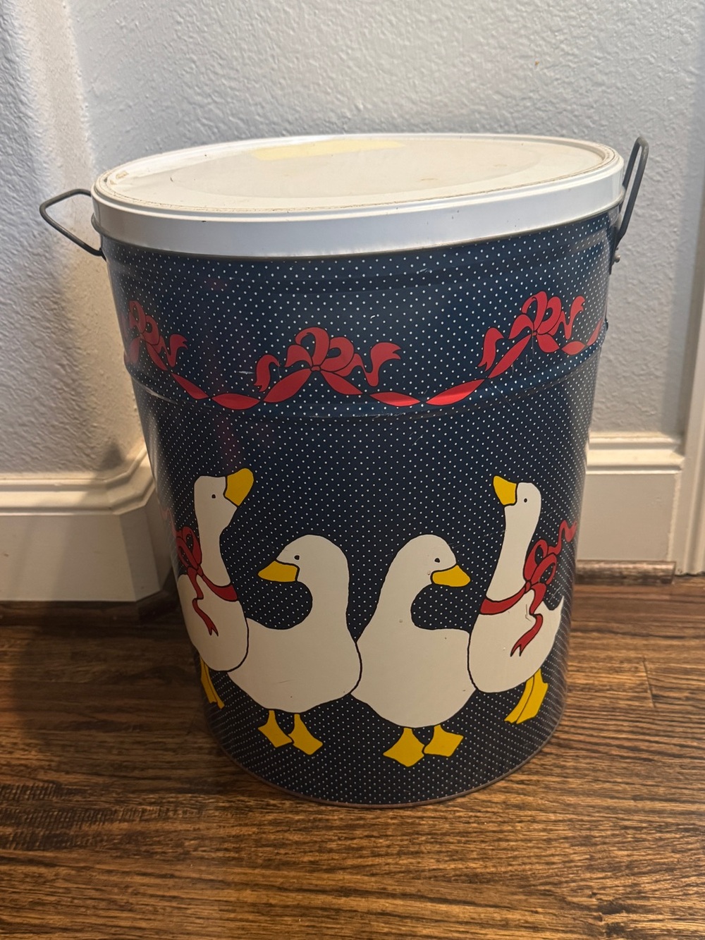 Vintage Decorative Navy Duck Tin Canister with Red Ribbon Accent